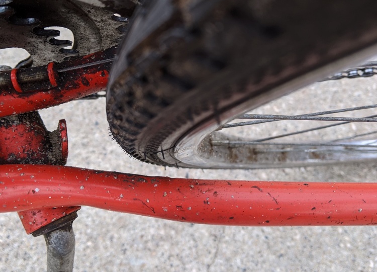 Rear tire rubbing