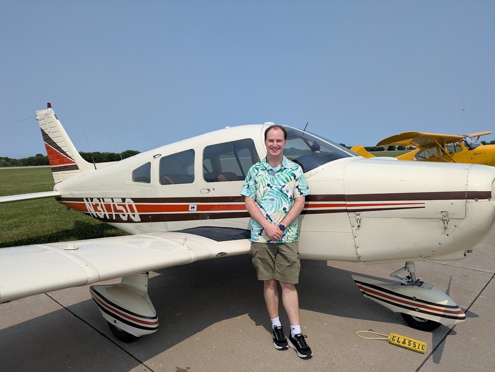 Me with the airplane after passing the checkride