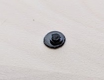 Broken plastic rivet head